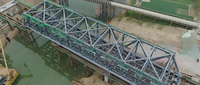 //rnrorwxhmqkplp5m.ldycdn.com/cloud/prBpmKrklkSRqlpklrlojp/Steel-Truss-Bridge.png